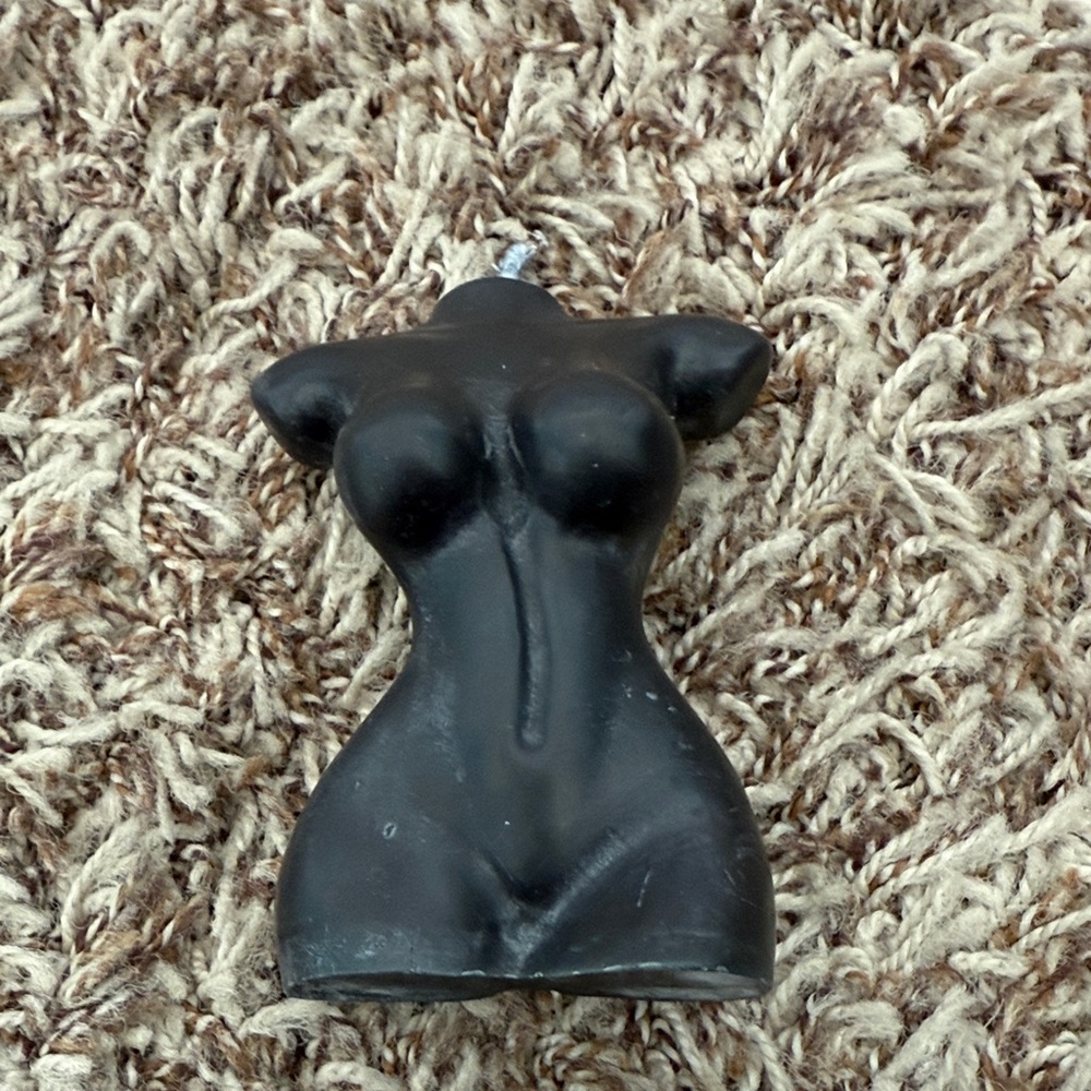 Sleek Black Female Form Sculpture